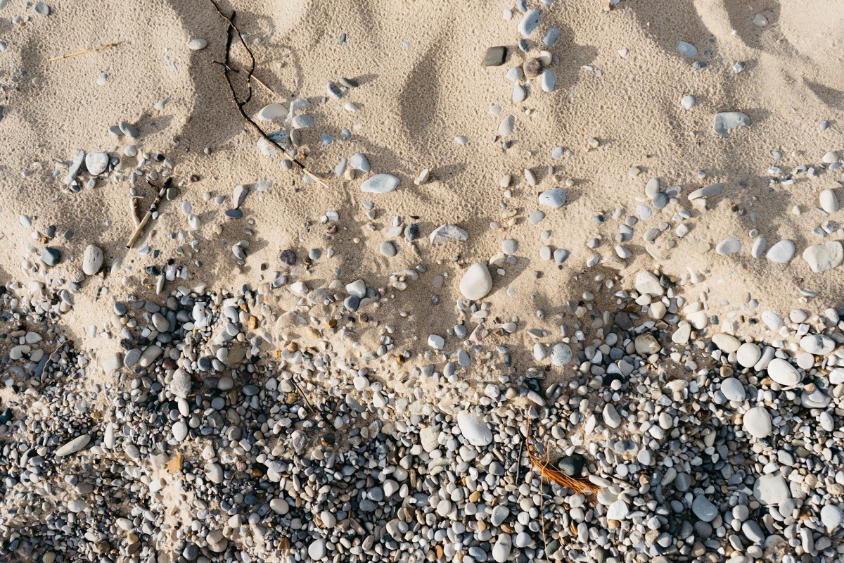 sand and pebbles on a beach